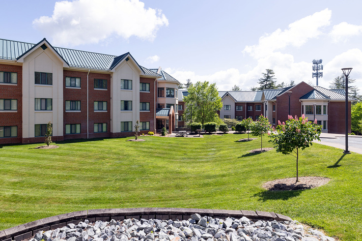 Appalachian Heights residence hall buildings surrounding a large landscaped lawn.