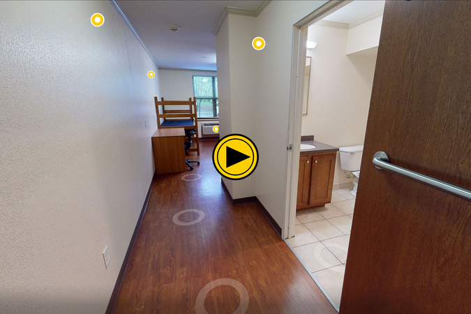 Virtual tour preview of Mountaineer Hall with beds, furniture and storage.