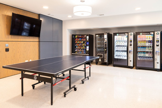 Raven Rocks Hall recreation area with ping-pong table, television and vending machines.